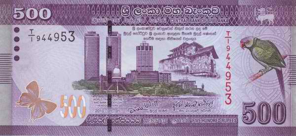  World Trade  Centre and Bank of Ceylon Headquarters in Colombo, ancient Buddhist temple  Lankathilaka Viharaya at Kandy, Sri Lanka emerald collared parakeet  (psittacula calthropae), Ceylon indigo royal butterfly (tajuria arida)