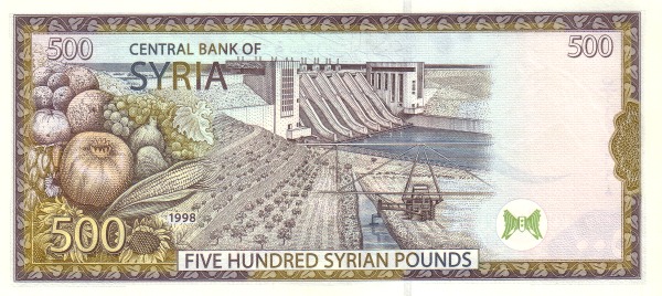 Tabqa dam on Euphrat  River,  tractor irrigating trees