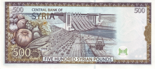Tabqa dam on Euphrat  River,  tractor irrigating trees