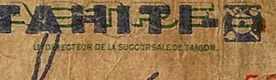 Text "DE SAIGON" in    right signature title not crossed out