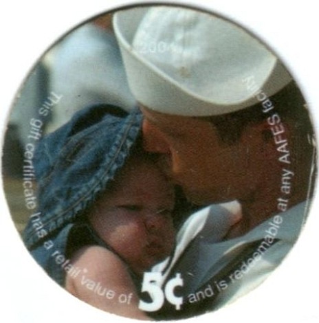 Sailor holding baby