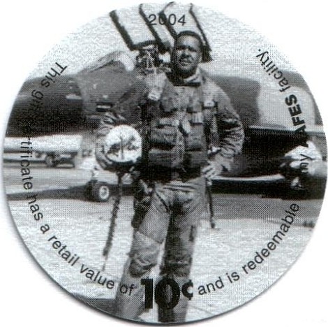 Soldier standing  before F-4 Phantom II