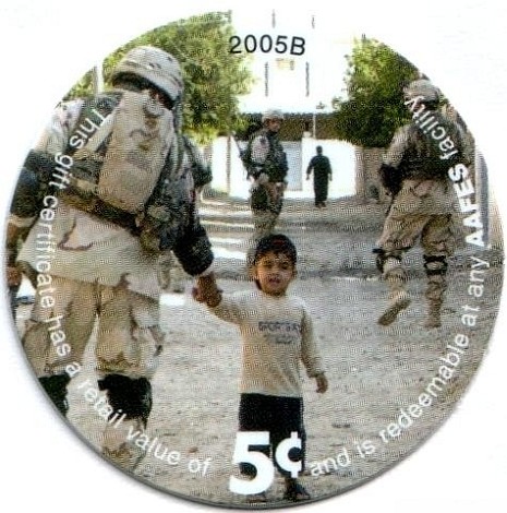 Soldiers giving kid  candy