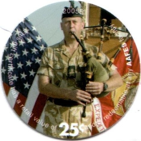 Soldier playing  bagpipes, flags