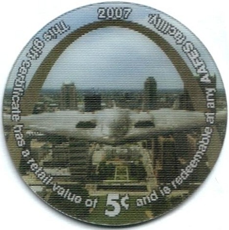 B-2 bomber swooping  under the Gateway Arch
