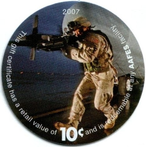 Soldier in battle  stance on front of an aircraft nosecone