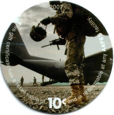 Soldier in front of a  C-130 aircraft