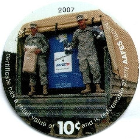 Soldiers on the back  of a truck with merchandize from AAFES