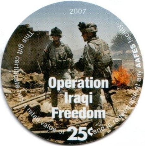 Soldiers on front opf  burning wreckage