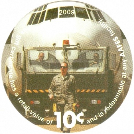 Soldiers pulling with  a truck a C-130 Hercules airplane